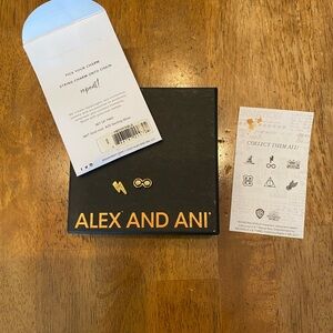 Alex and Ani Gold Lightning Bolt & Infinity Dot string charms.